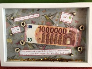 Geldgeschenk im Rahmen 1 Million Euro